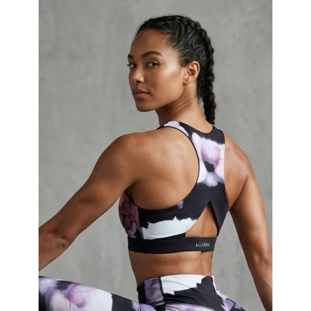 All Fenix Rosa Sports Bra in a black multi-color floral print Size M